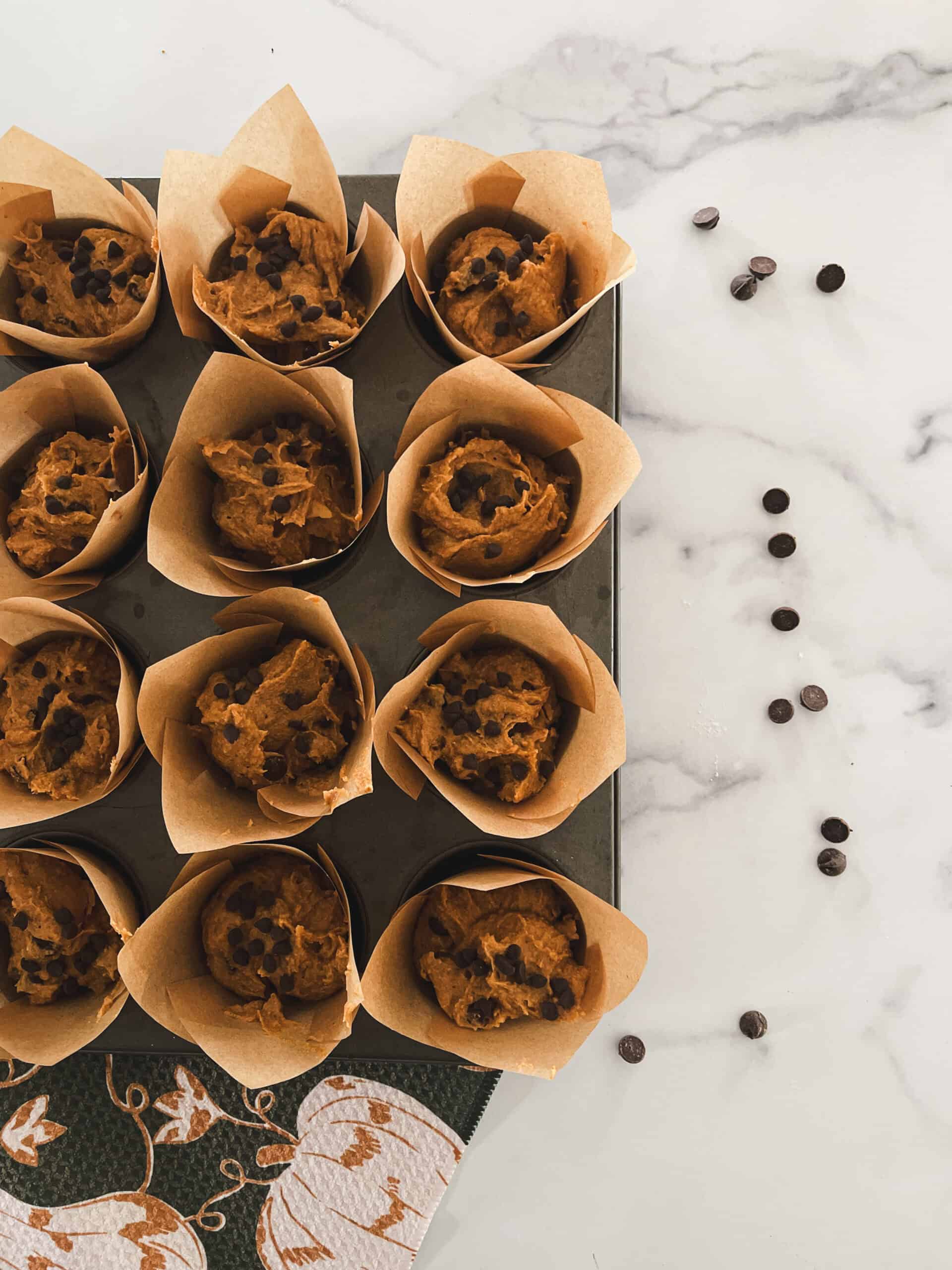 Pumpkin muffins in muffin tin. 